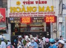 Tướng Phan Anh Minh kiểm tra hồ sơ vụ khám xét tiệm vàng của công an Bình Thạnh