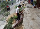 Nhà dân nổi cao hơn mặt đường cả mét ở Sài Gòn