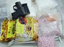 Tài xế xe ôm tàng trữ súng vận chuyển ma túy