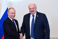 Tổng thống Nga Vladimir Putin (trái) và người đồng cấp Belarus - ông Alexander Lukashenko. Ảnh: SPUTNIK