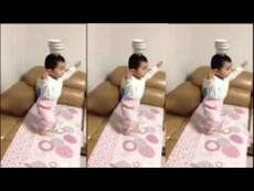 Trố mắt xem bé ba tuổi 'làm xiếc'