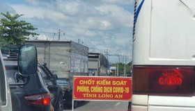 Long An: Người tiêm 2 mũi vaccine được qua chốt kiểm soát