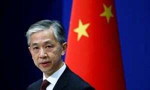 Người phát ngôn Bộ Ngoại giao Trung Quốc – ông Uông Văn Bân. Ảnh: REUTERS