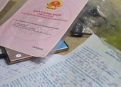 Bắt nhóm người làm giả hàng chục sổ đỏ để bán đất ảo