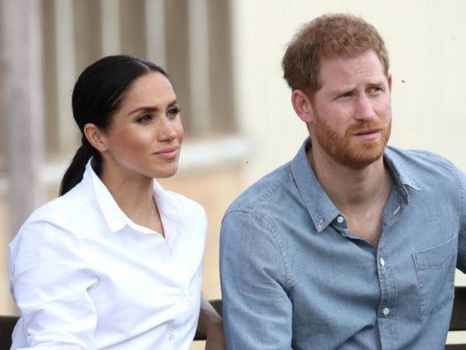 Vợ chồng hoàng tử Harry. Ảnh: GETTY IMAGES