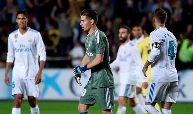 Zidane dùng 'ô dù' cho con trai
