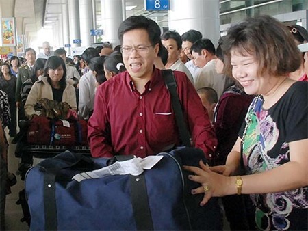Việt kiều sẽ không còn phải đăng ký giữ quốc tịch Việt Nam
