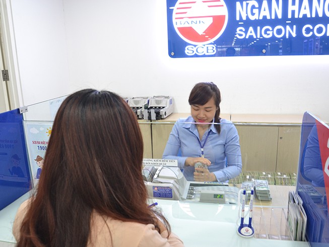 ‘Tỉ giá đang có lợi cho người giữ tiền Việt Nam’