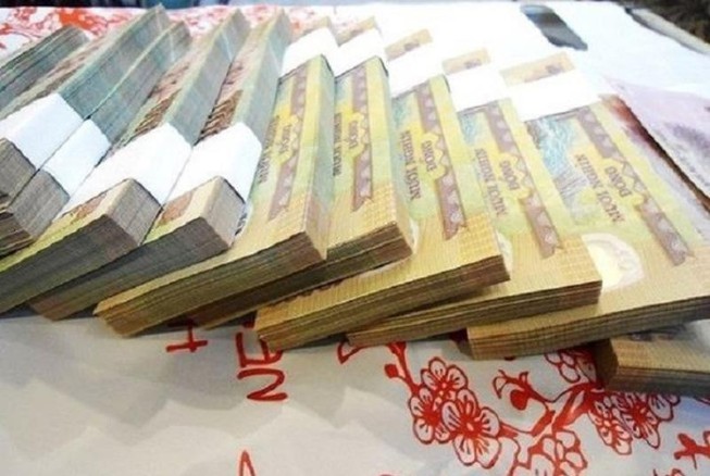 Cẩn trọng bẫy lừa đổi tiền lẻ dịp tết