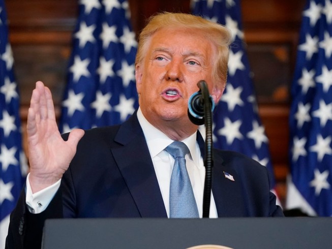 Tổng thống Donald Trump trong một cuộc họp báo ở Nhà Trắng vào tháng 1-2020. Ảnh: REUTERS
