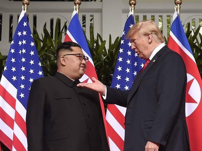 Cựu Tổng thống Donald Trump và Nhà lãnh đạo Triều Tiên Kim Jong-un. Ảnh: Saul Loeb/AFP