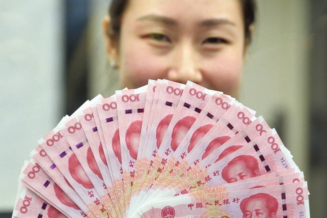 trong vòng 9 tháng qua, đồng Nhân dân tệ đã mất 9% giá trị so với đồng USD.- Ảnh từ Internet