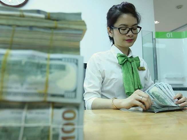 Mỹ lại tăng lãi suất, tiền đồng Việt Nam sẽ ra sao?