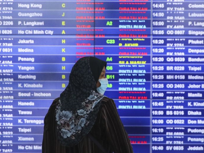 Malaysia cấm du khách nhập cảnh, cấm công dân ra nước ngoài. Ảnh: EPA