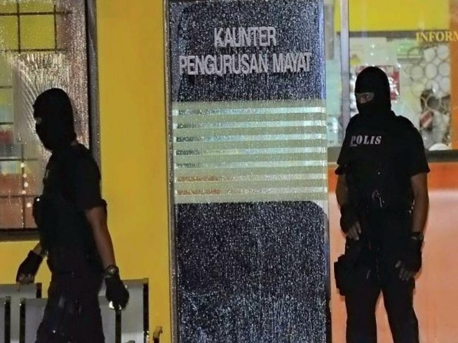 Malaysia điều đặc nhiệm canh gác thi thể Kim Jong-nam