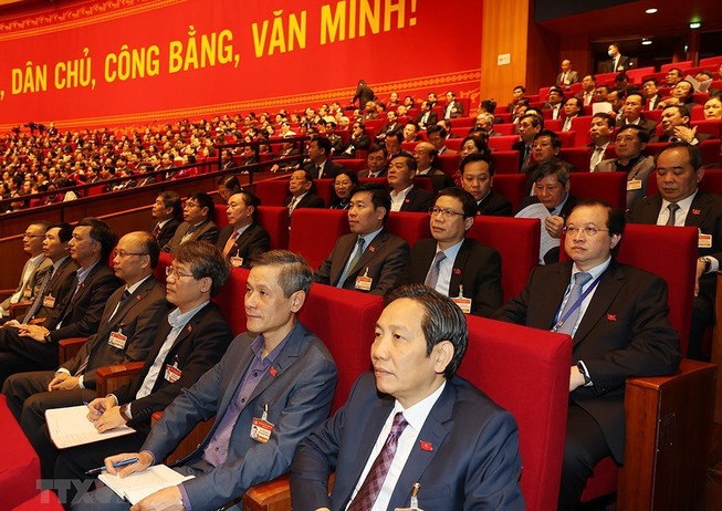 Đại biểu dự phiên thảo luận các văn kiện đại hội tại hội trường, sáng 28-1. Ảnh: TTXVN
