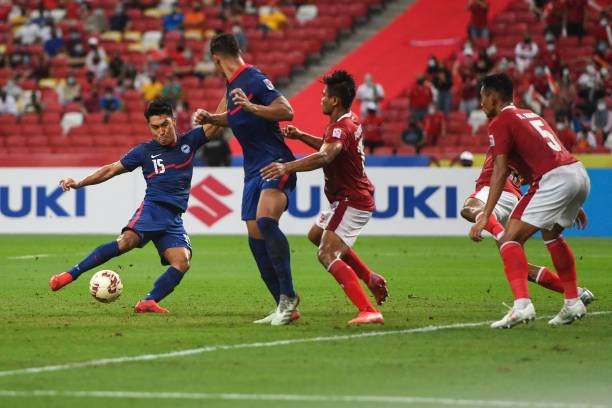 Indonesia hạ Singapore vào chung kết AFF Cup trong trận đấu điên rồ - ảnh 1