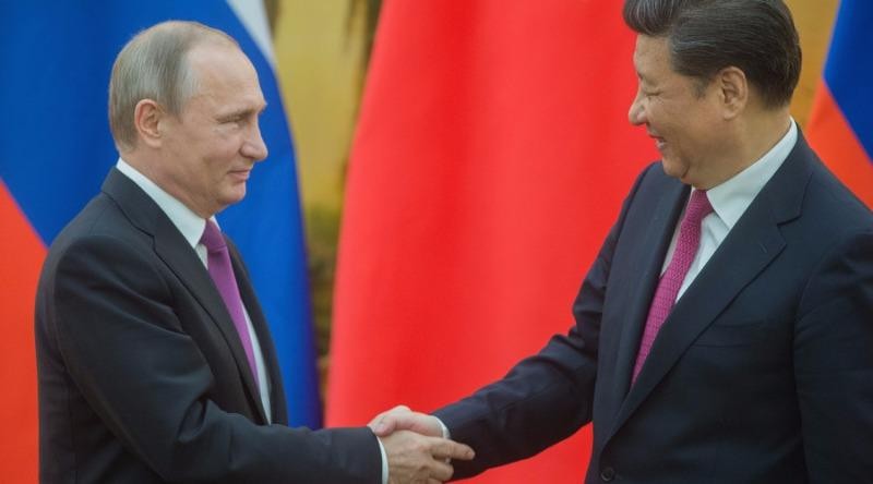 Tổng thống Putin tận tay tặng kem cho ông Tập Cận Bình - ảnh 1