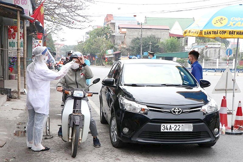 COVID-19: Nhiều địa phương siết chặt việc phòng chống - ảnh 1