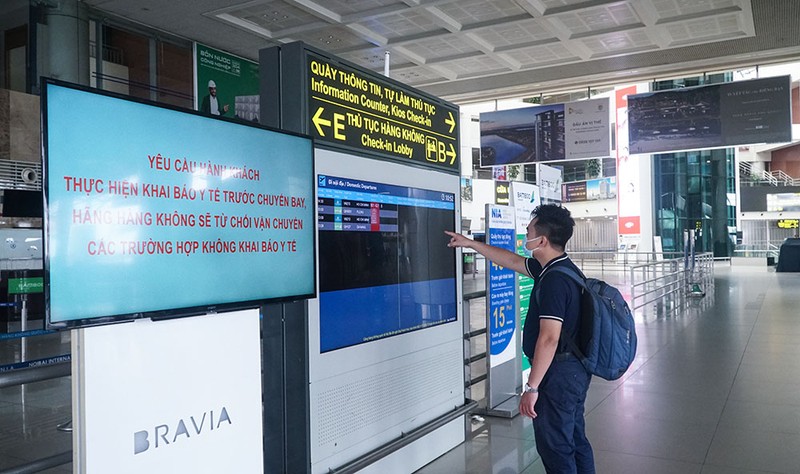 Cận cảnh sân bay Nội Bài ngày đầu mở cửa đón khách trở lại - ảnh 8