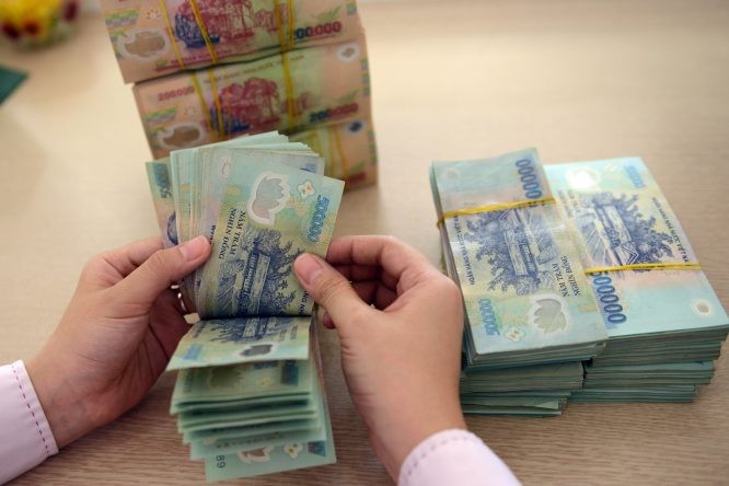 Mỹ không hạ lãi suất, tiền Việt thời gian tới sẽ ra sao? - ảnh 1