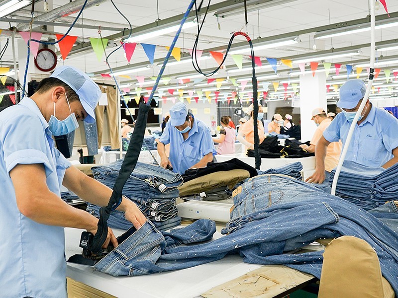 Nhân sự ngành dệt may Việt Nam tăng nhờ đơn hàng dồi dào - ảnh 1