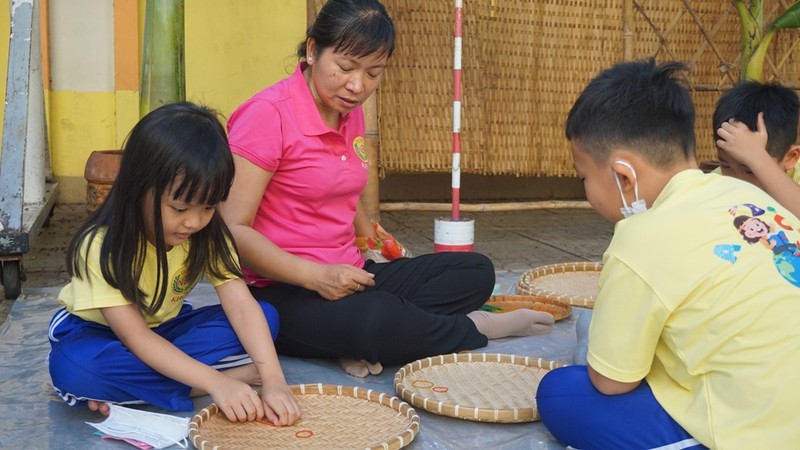 Học sinh lớp 1 hào hứng với ngày hội 'Một thoáng quê hương' - ảnh 5