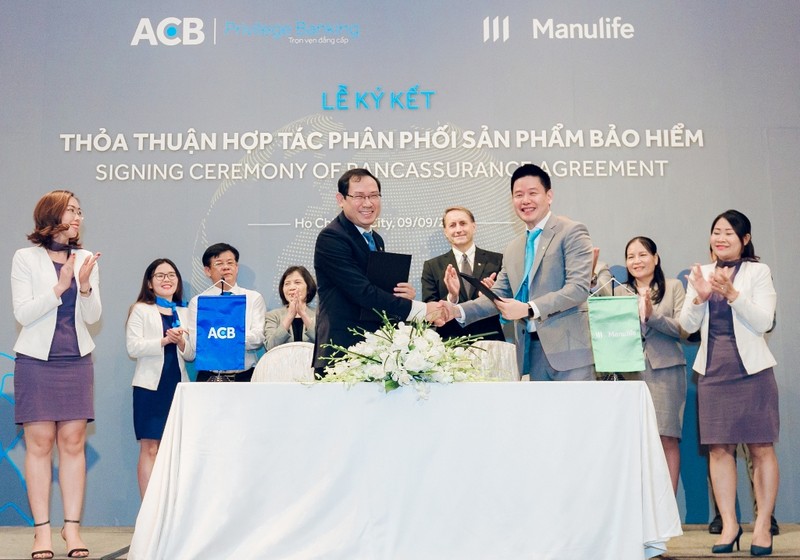 Manulife Việt Nam và ACB mở rộng hợp tác phân phối bảo hiểm - ảnh 1
